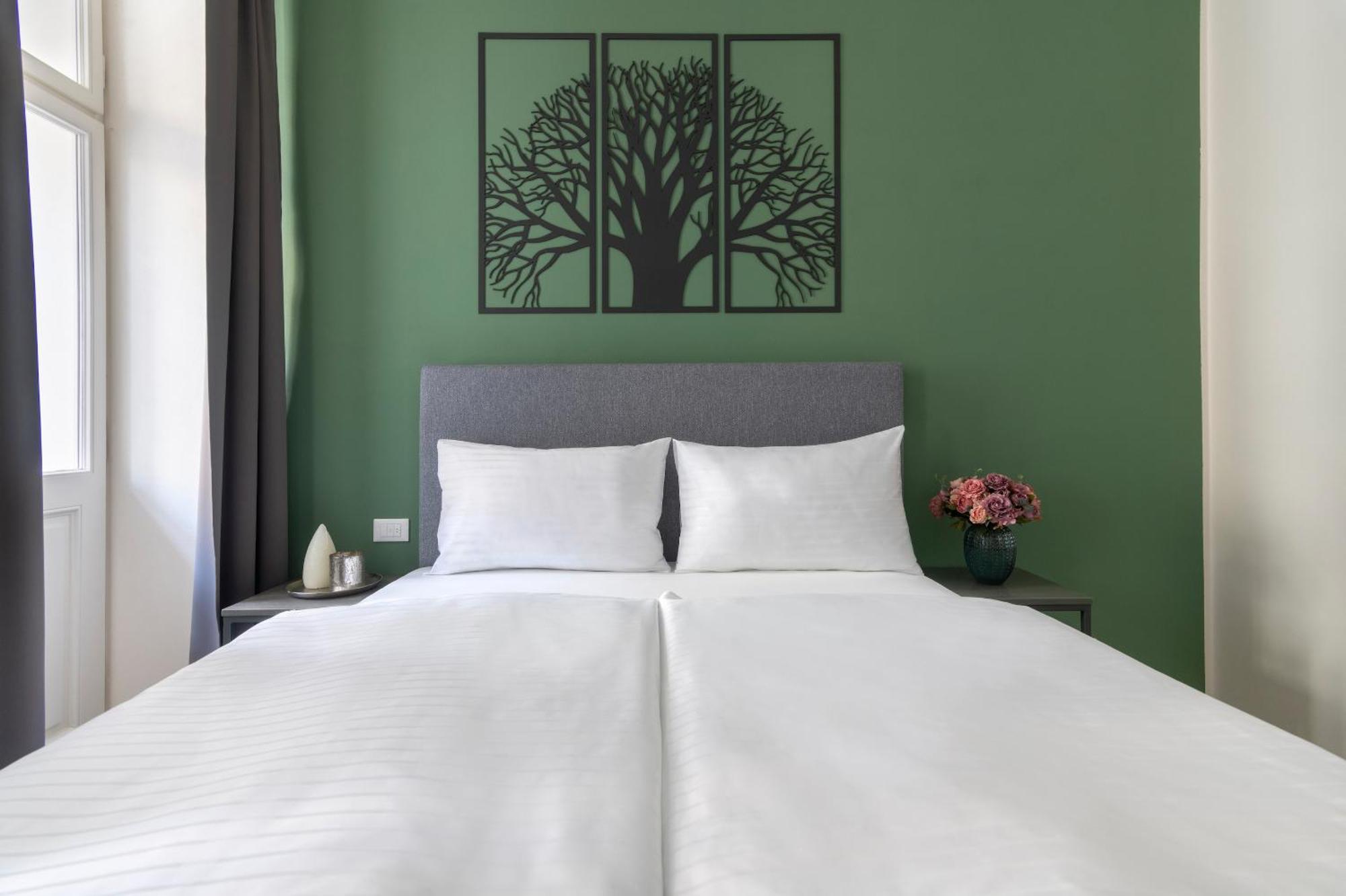 Kinsky Garden Apartments And Suites By Dwellfort Praha Bagian luar foto
