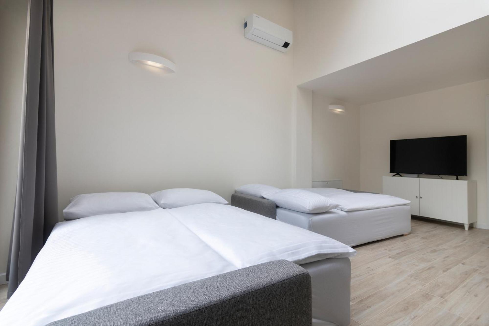 Kinsky Garden Apartments And Suites By Dwellfort Praha Ruang foto